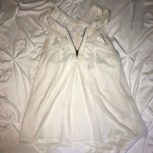 White chiffon cage detail zip front blouse